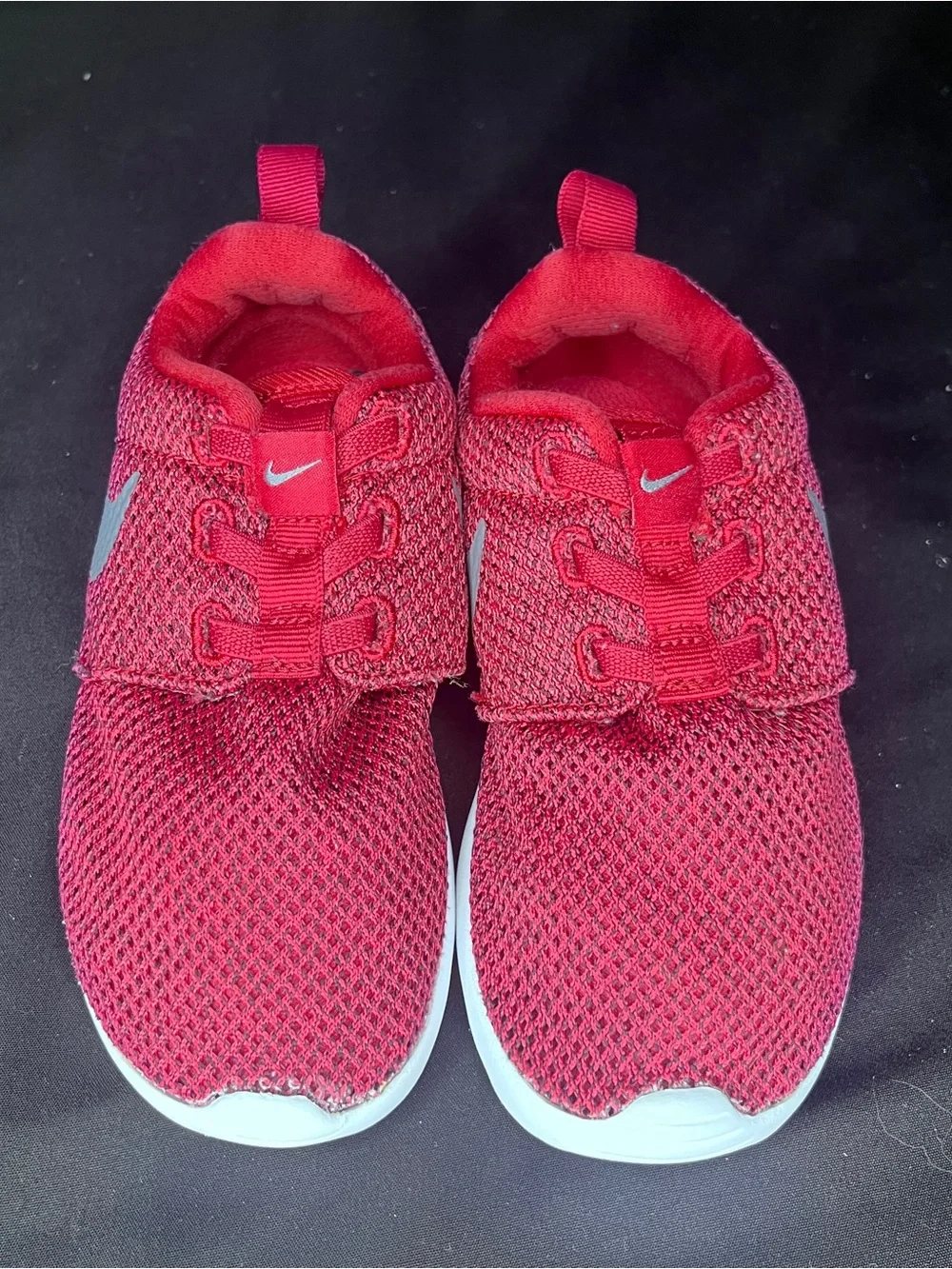 Nike Kids Mesh sneakers with elastic top. Size